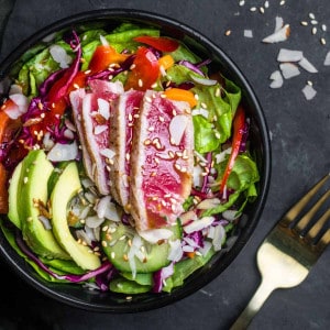 Ahi Tuna Salad served in a black bowl and photographed from the top.