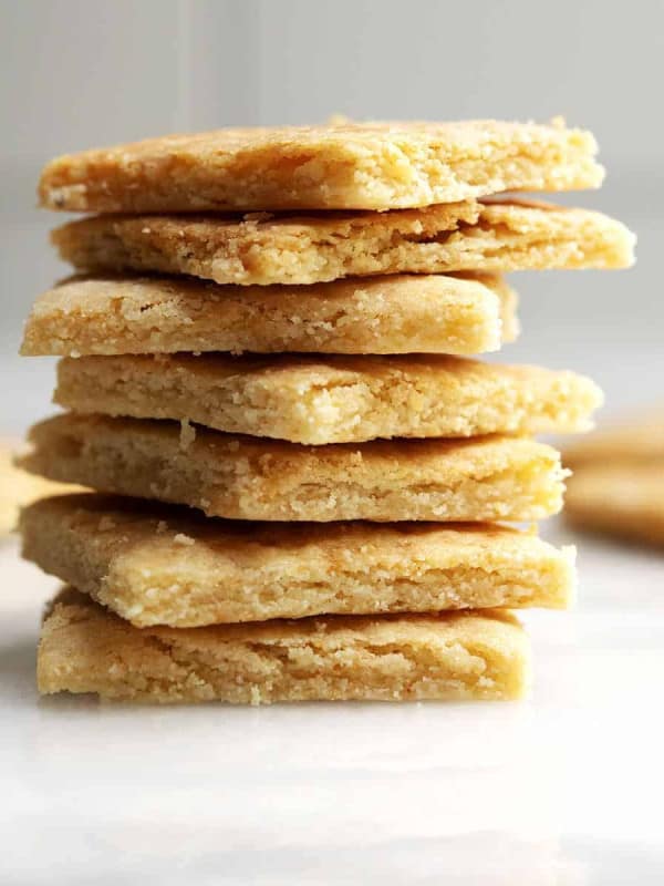 Almond Flour Crackers stacked on a white marble board