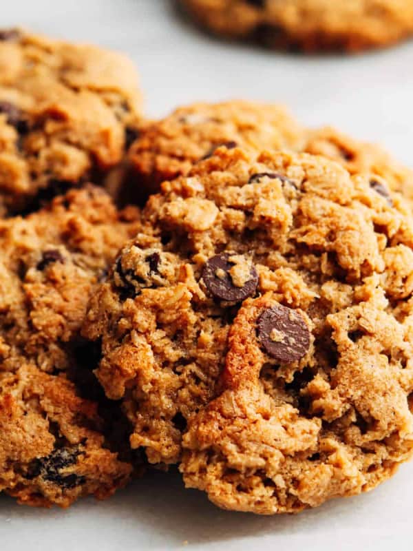 Almond Flour Oatmeal Cookies stacked on a white marble board