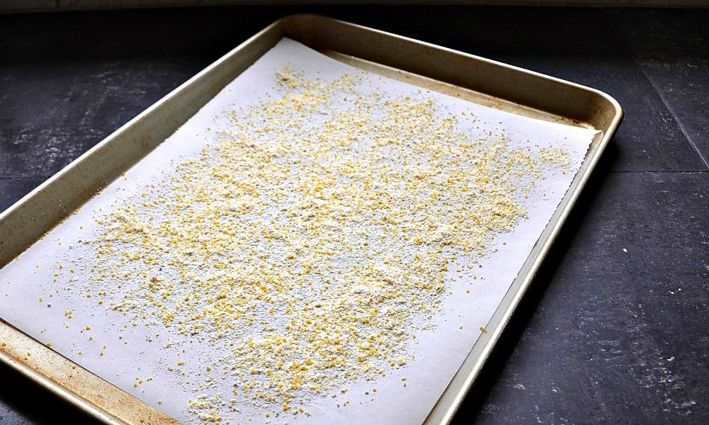 Baking Sheet lined with Parchment and dusted with flour and cornmeal