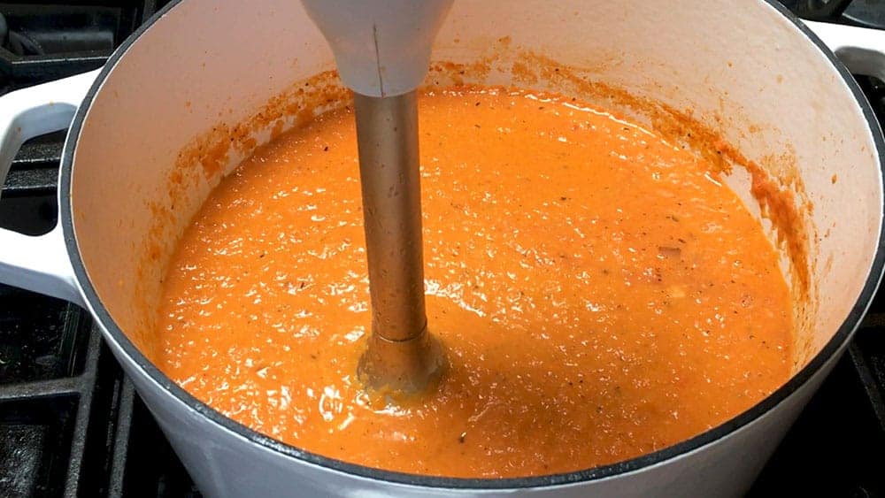 Blending Tomato Bisque until smooth