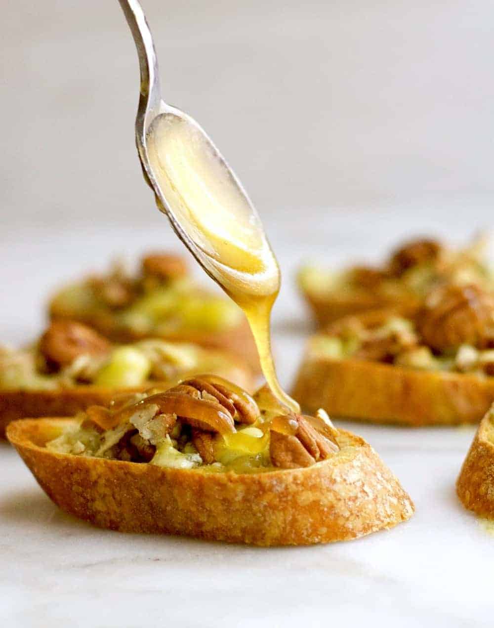 An easy recipe for Blue Cheese Crostini with Pecans and Honey