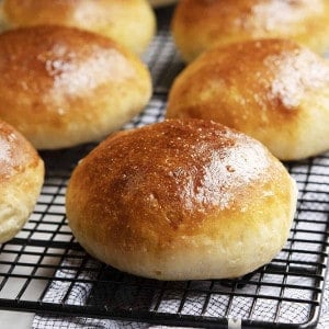 brioche buns on cooling rack