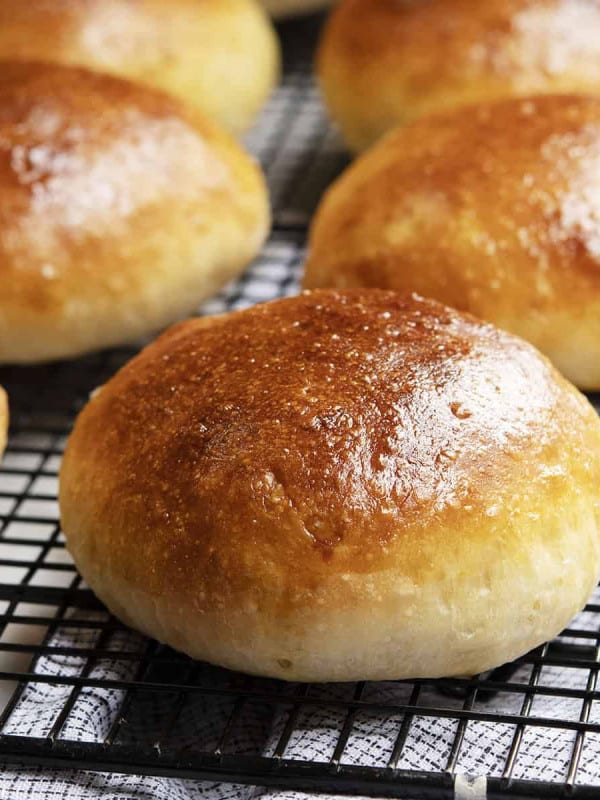 brioche buns on cooling rack