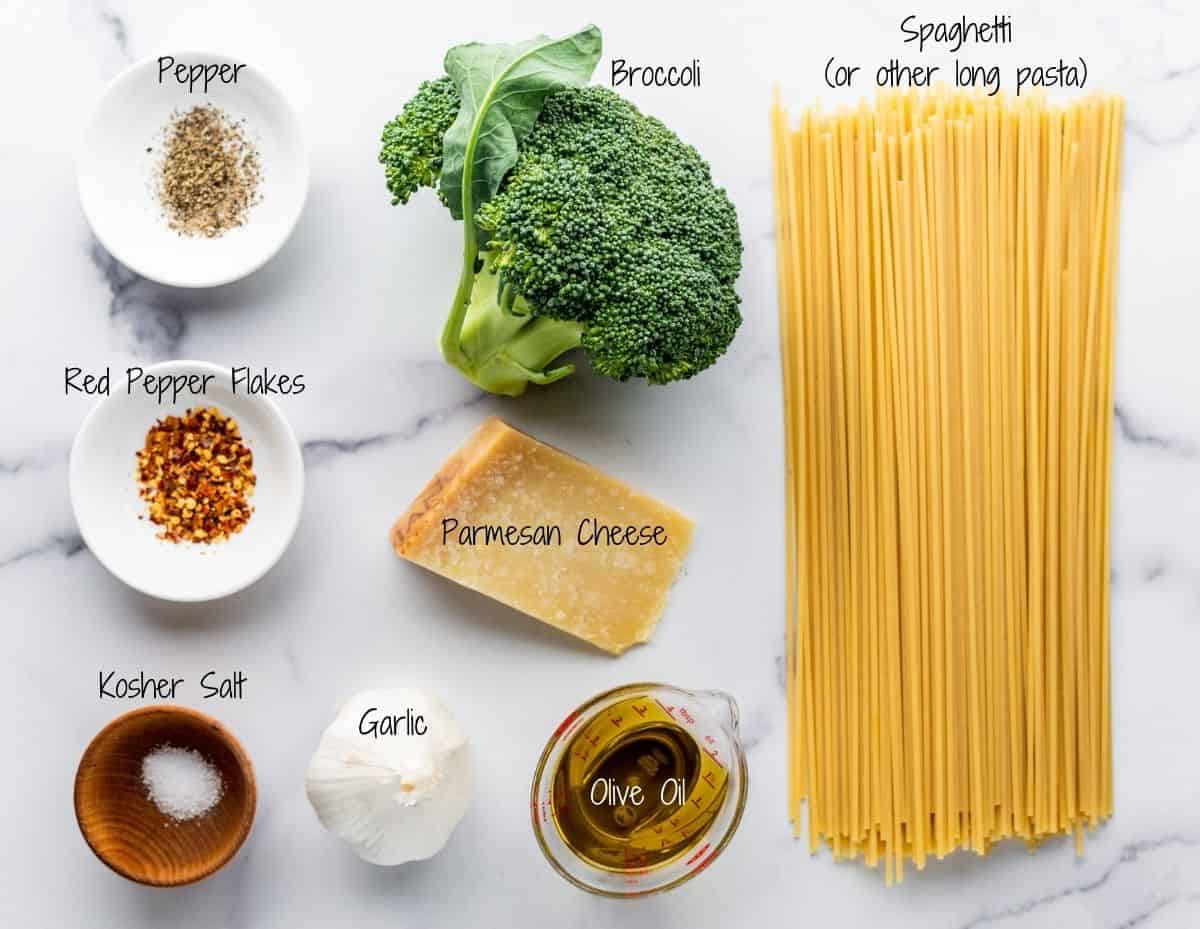 Broccoli Pasta Ingredients on a white marble board.