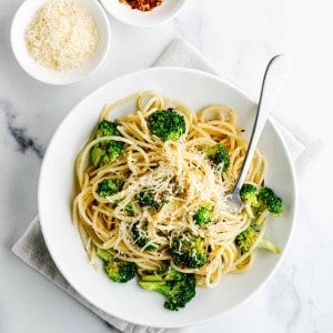 Broccoli Pasta served in a white bowl photographed from above.