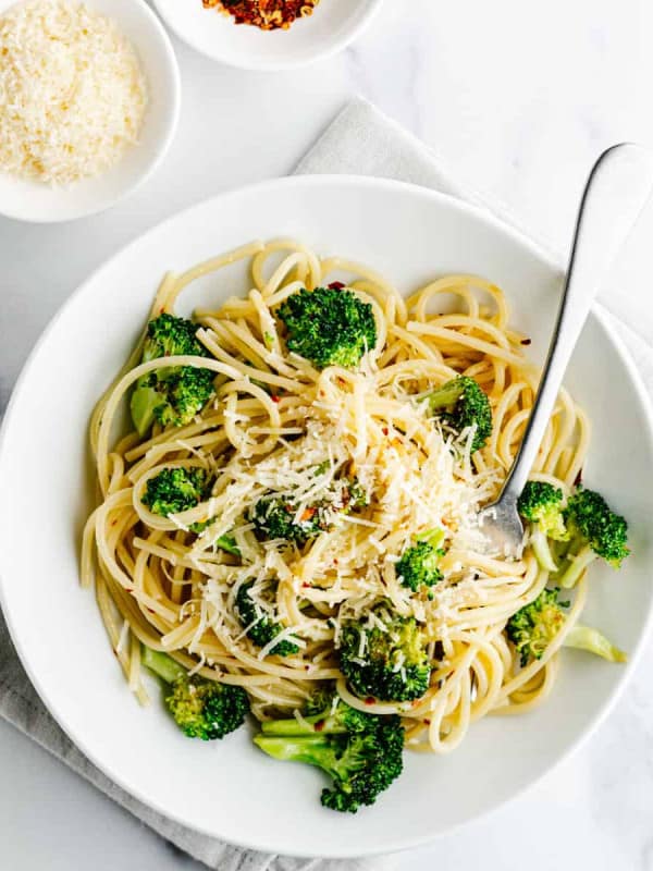 Broccoli Pasta served in a white bowl photographed from above.