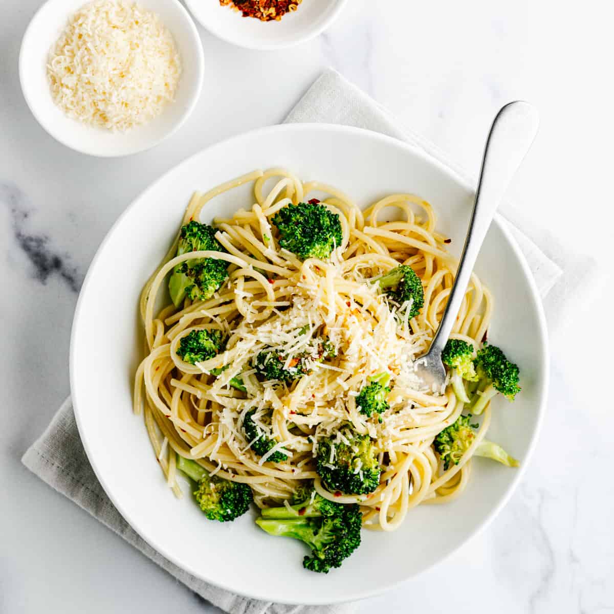 Broccoli Pasta served in a white bowl photographed from above.