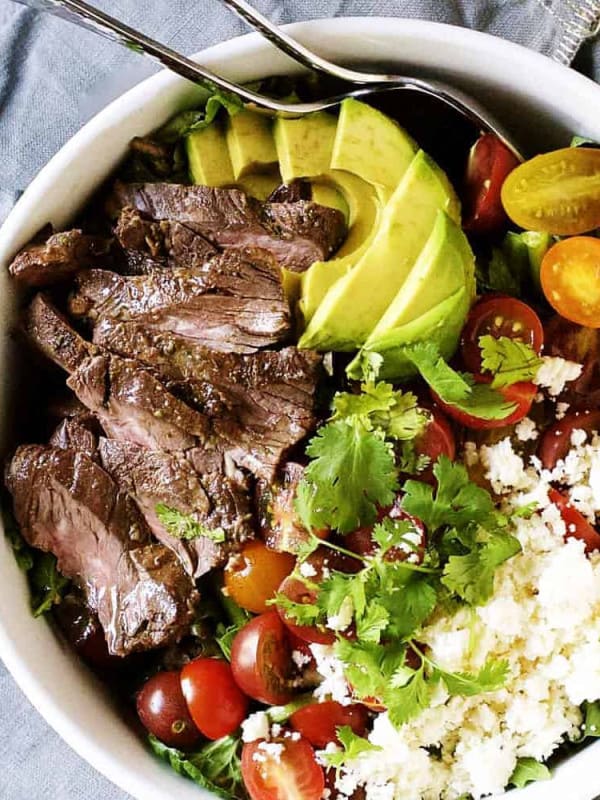 Carne-Asada-Steak-Salad served in a white bowl