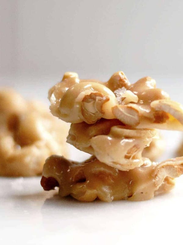 Cashew Brittle stacked on a marble board