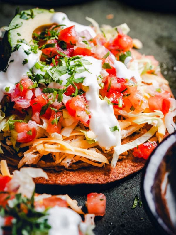 Close up photograph of chicken tostada.