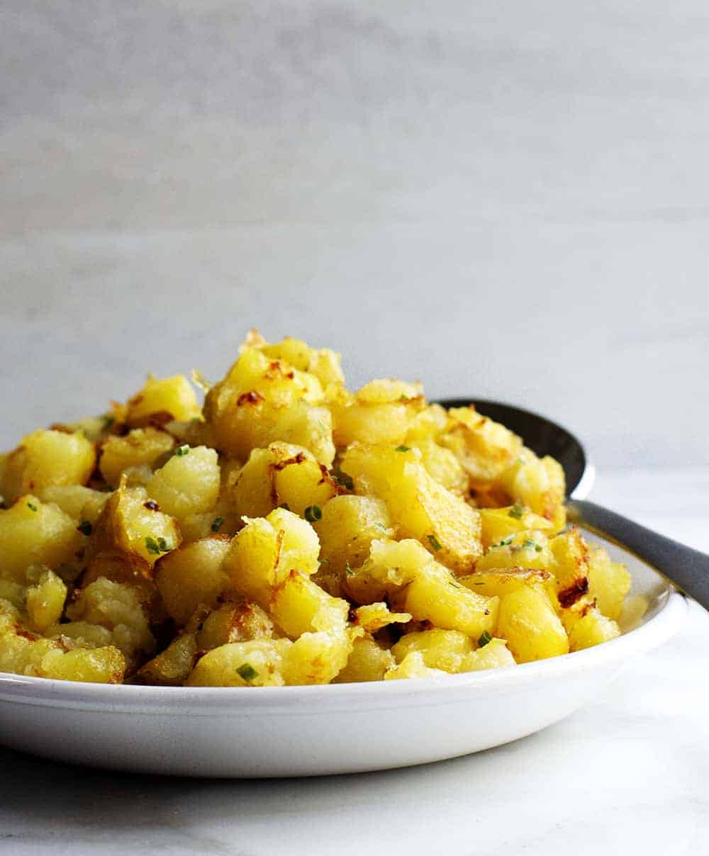 Crispy Breakfast Potatoes Served on a White Platter