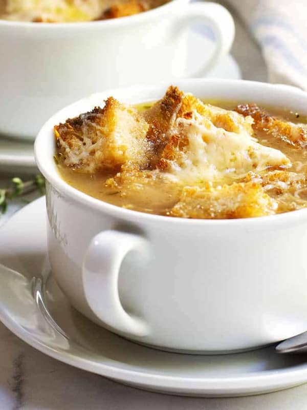 French Onion Soup served in white bowls