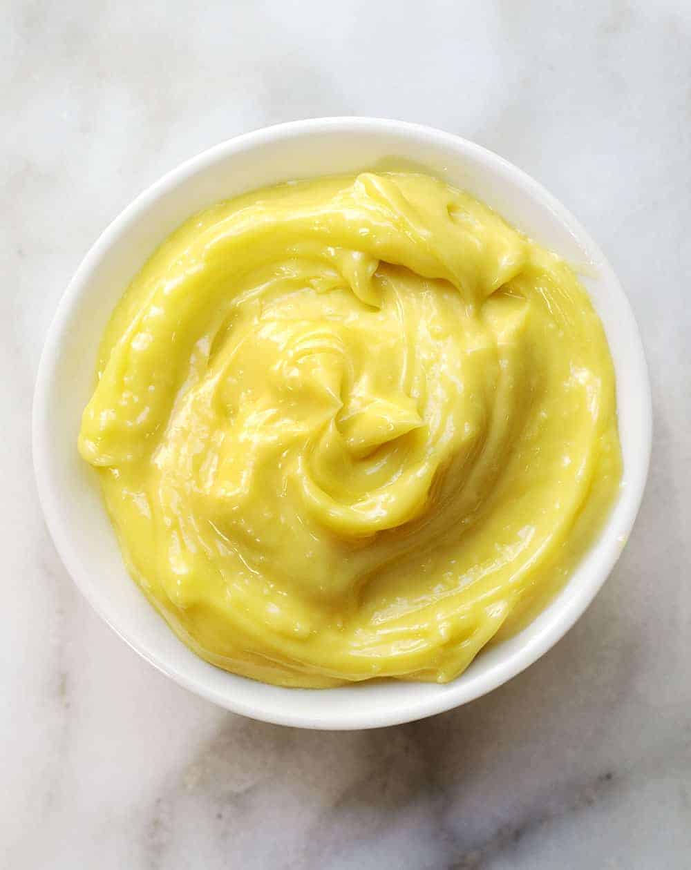 garlic aioli served in a small white bowl