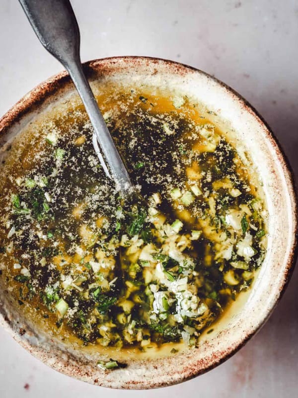 Garlic Parmesan Wing Sauce in a ceramic bowl photographed from the top.