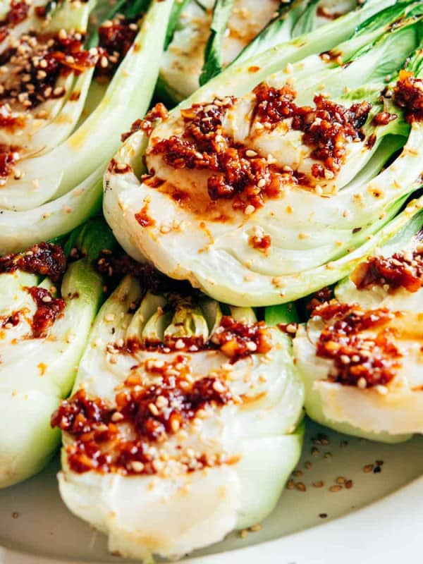 Grilled Baby Bok Choy on a white platter.