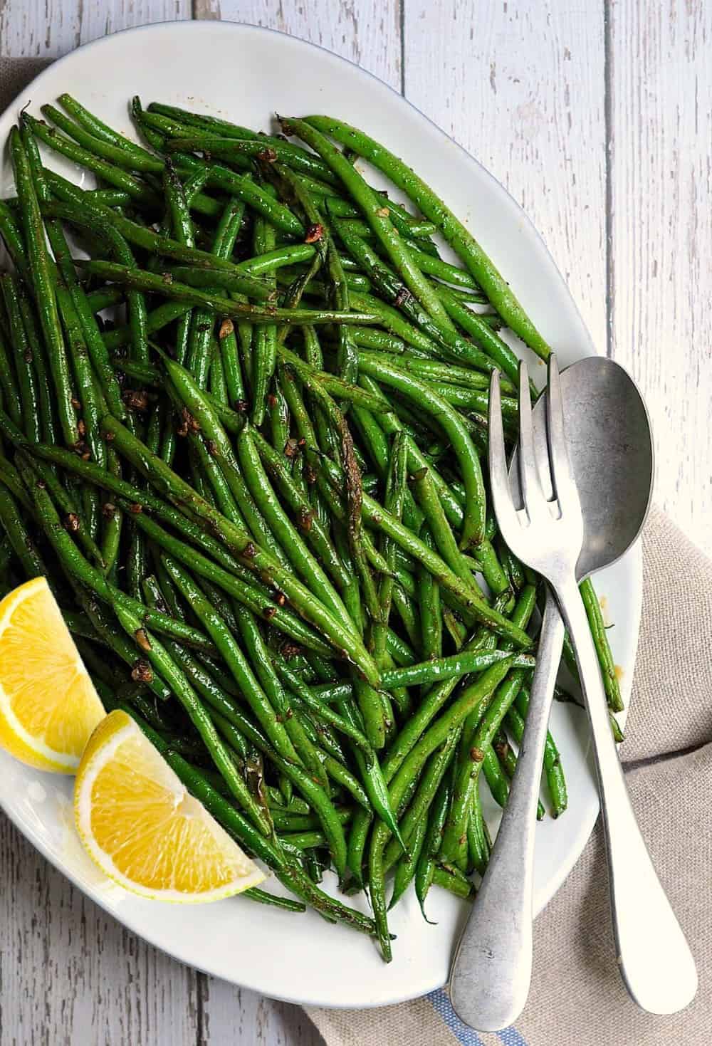 Grilled Green Beans with Lemon Wedges