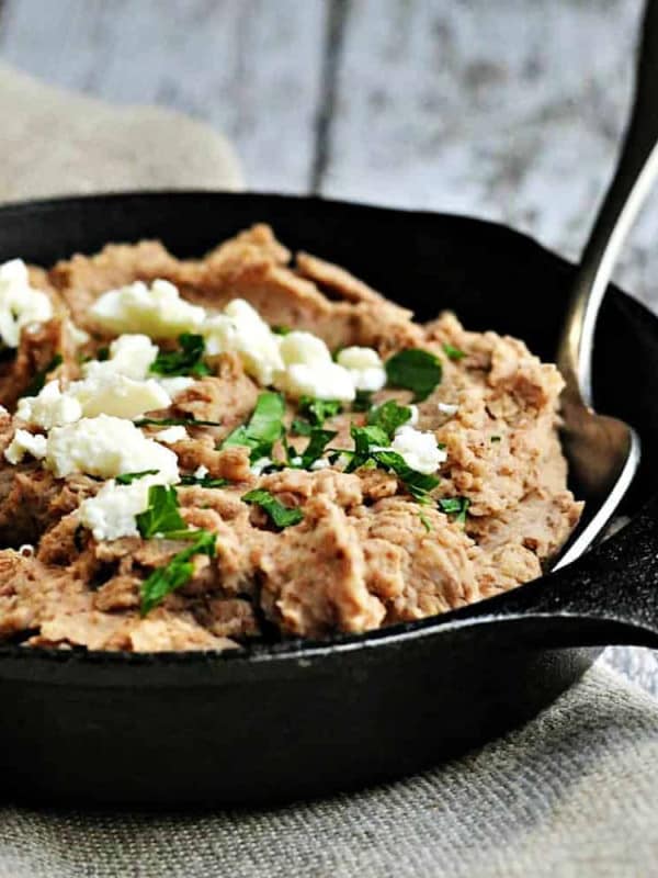 Homemade Refried-Beans served in a skillet featured