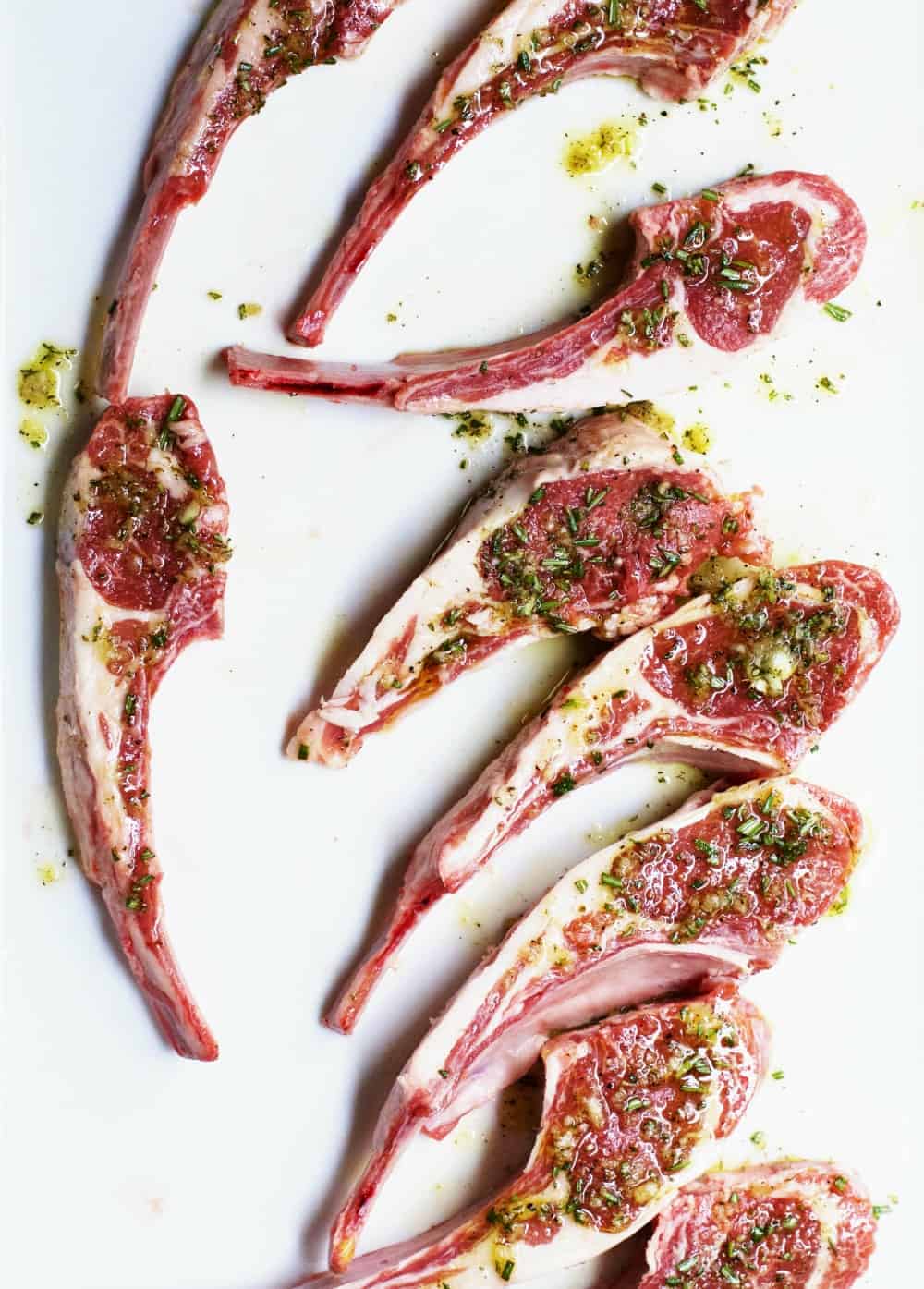 Lamb Chops on a White Platter Ready to Grill