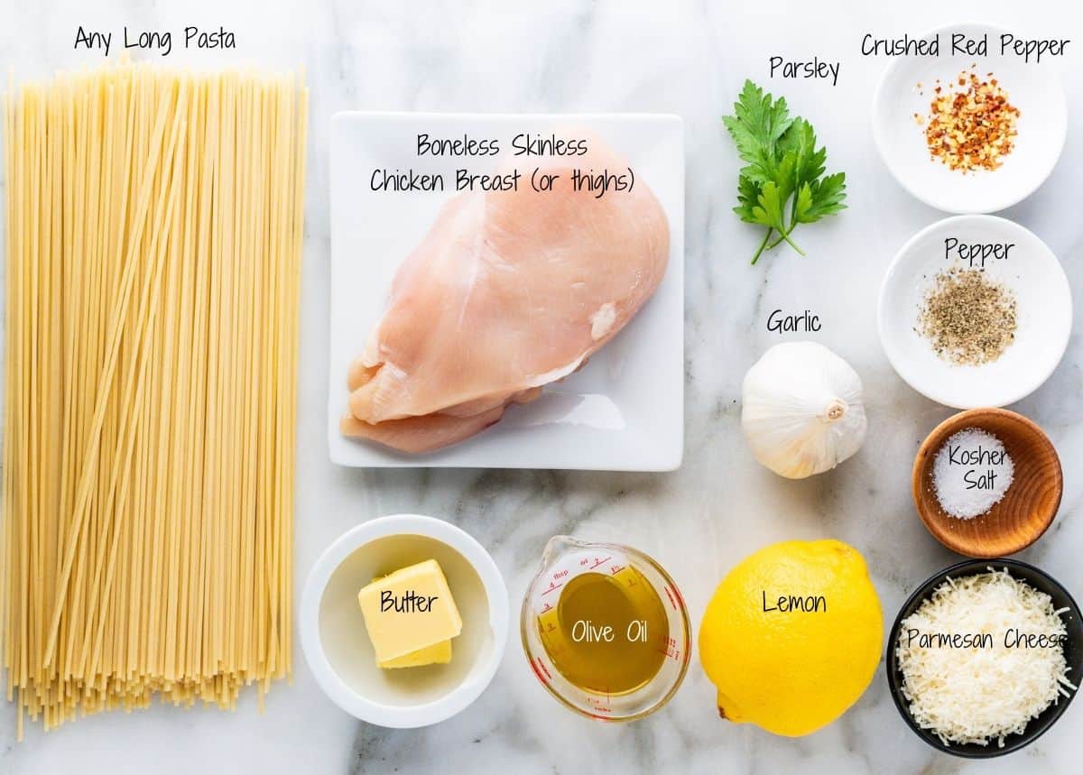 Lemon Garlic Chicken Pasta Ingredients on a white marble board.