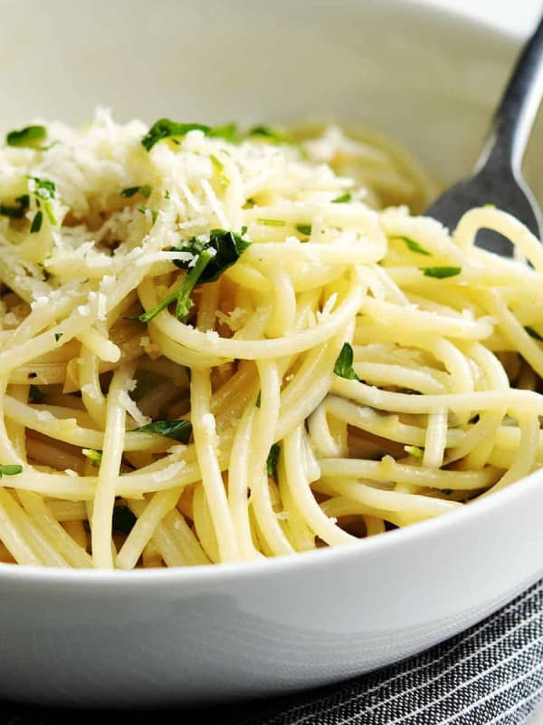 lemon garlic pasta served in a white bowl