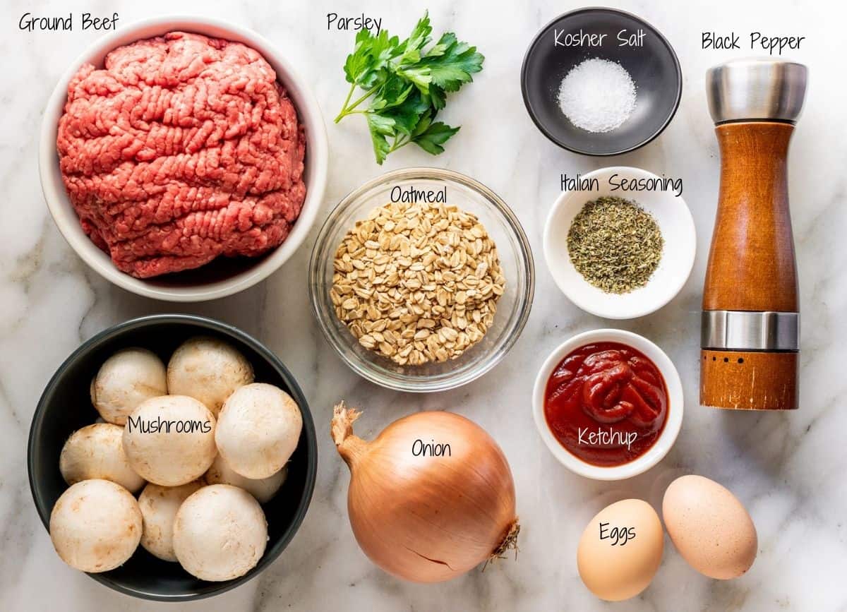 Meatloaf with Oatmeal Ingredients on a white marble board