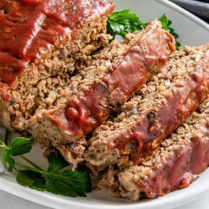 Meatloaf with Oatmeal close up slices on white platter