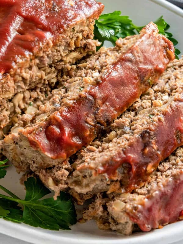 Meatloaf with Oatmeal close up slices on white platter