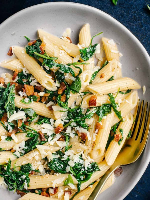 Pancetta Pasta served in a white bowl and photographed from the top.