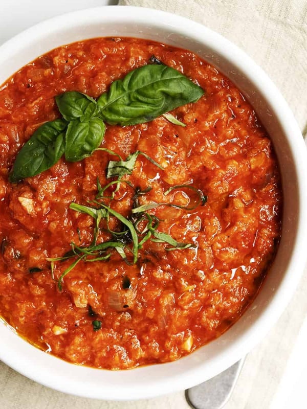 Pappa al Pomodoro served in a white bowl on a linen napkin