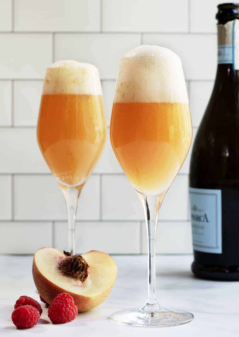 peach bellini cocktails served in flutes