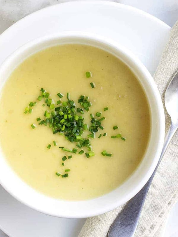 Potato Leek Soup served in white bowls