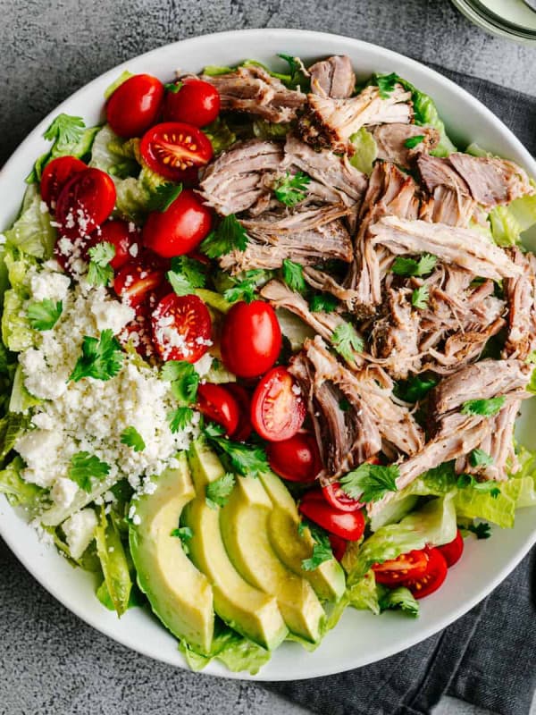 Pulled Pork Salad served in a white bowl and photographed from the top.