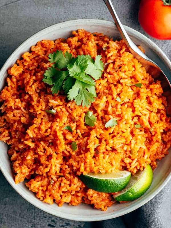 Rice Cooker Mexican Rice served in a gray ceramic bowl and photographed from above.