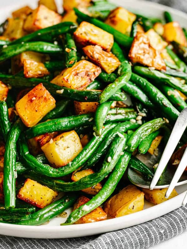 Roasted Green Beans and Potatoes served on a white platter.