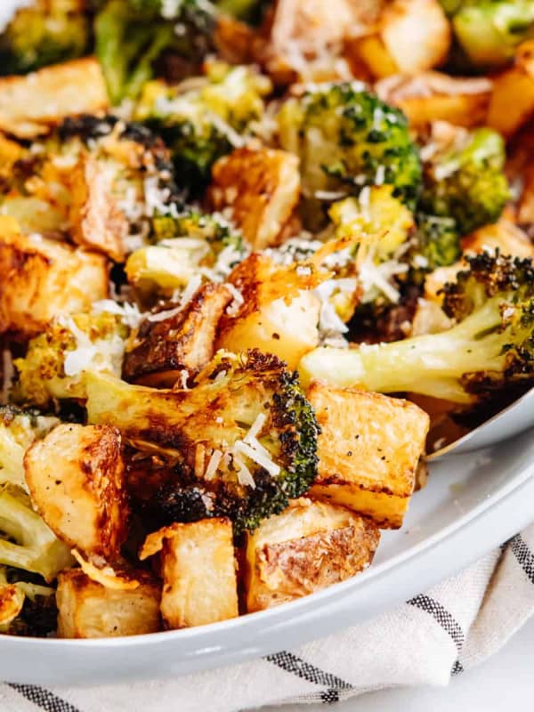 Roasted Potatoes and Broccoli on an oval platter.