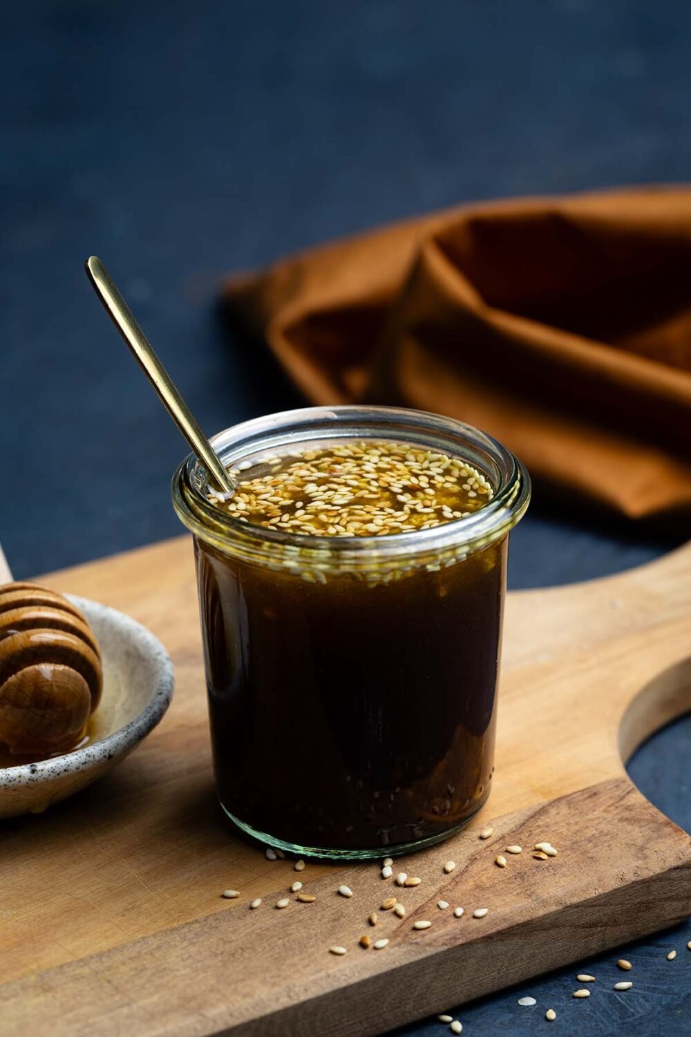 Sesame Ginger Dressing served in a small glass jar.