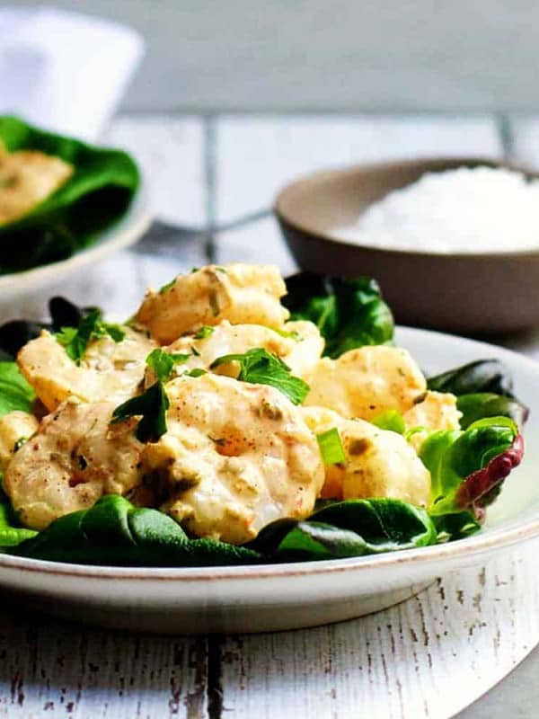 Shrimp-Remoulade-Salad_ served on white plates featured