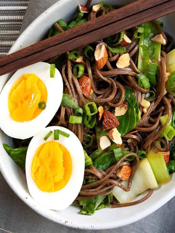 Soba Noodle Bowl served with wooden chopsticks photographed from above