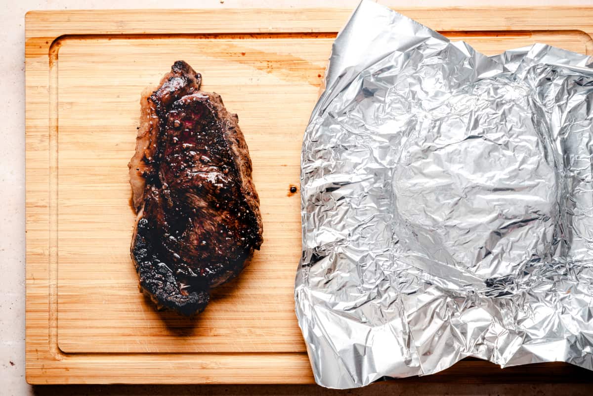 seared steak resting before slicing.