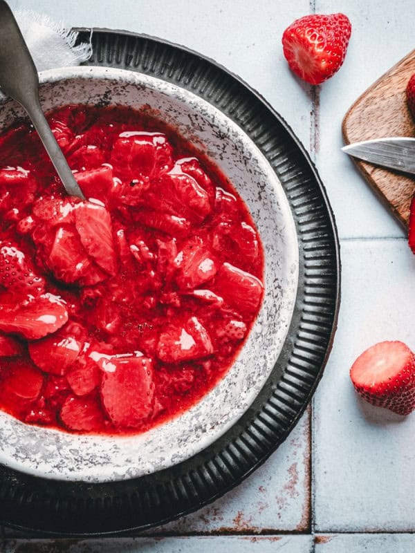 Strawberry Compote served in a dappled gray bowl.