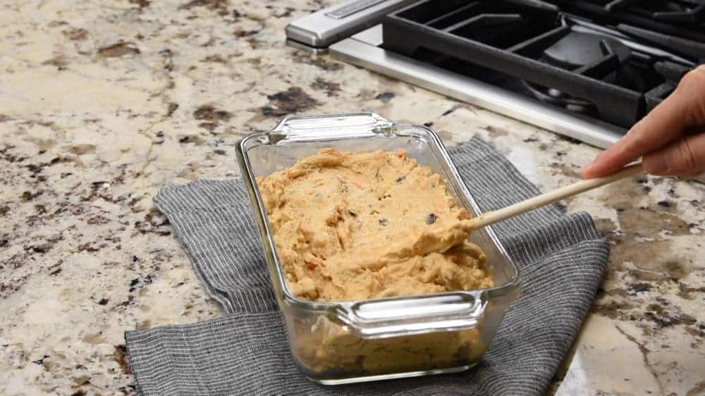 sweet potato bread batter in a loaf pan ready to bake