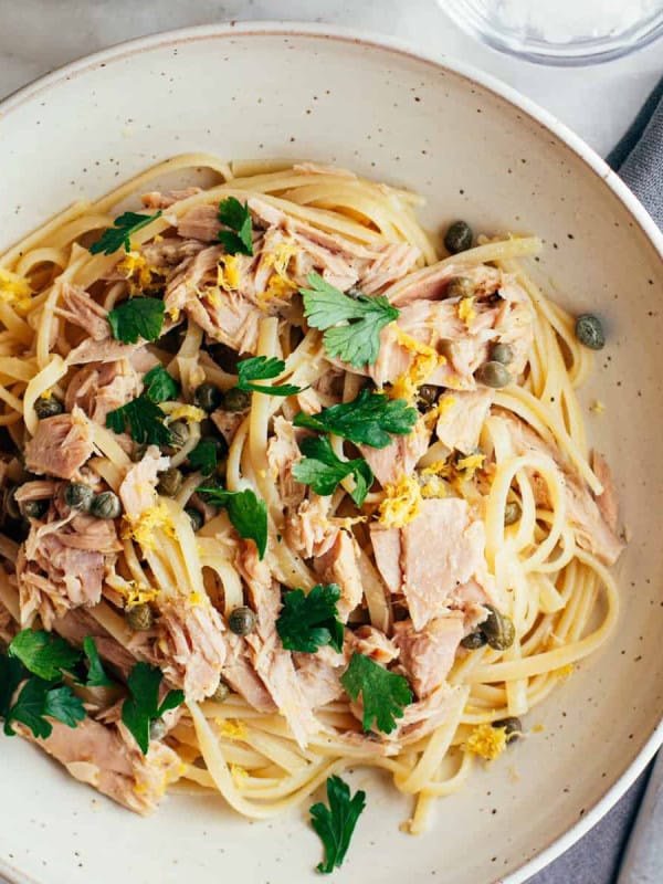 tuna pasta served in an off-white ceramic bowl..