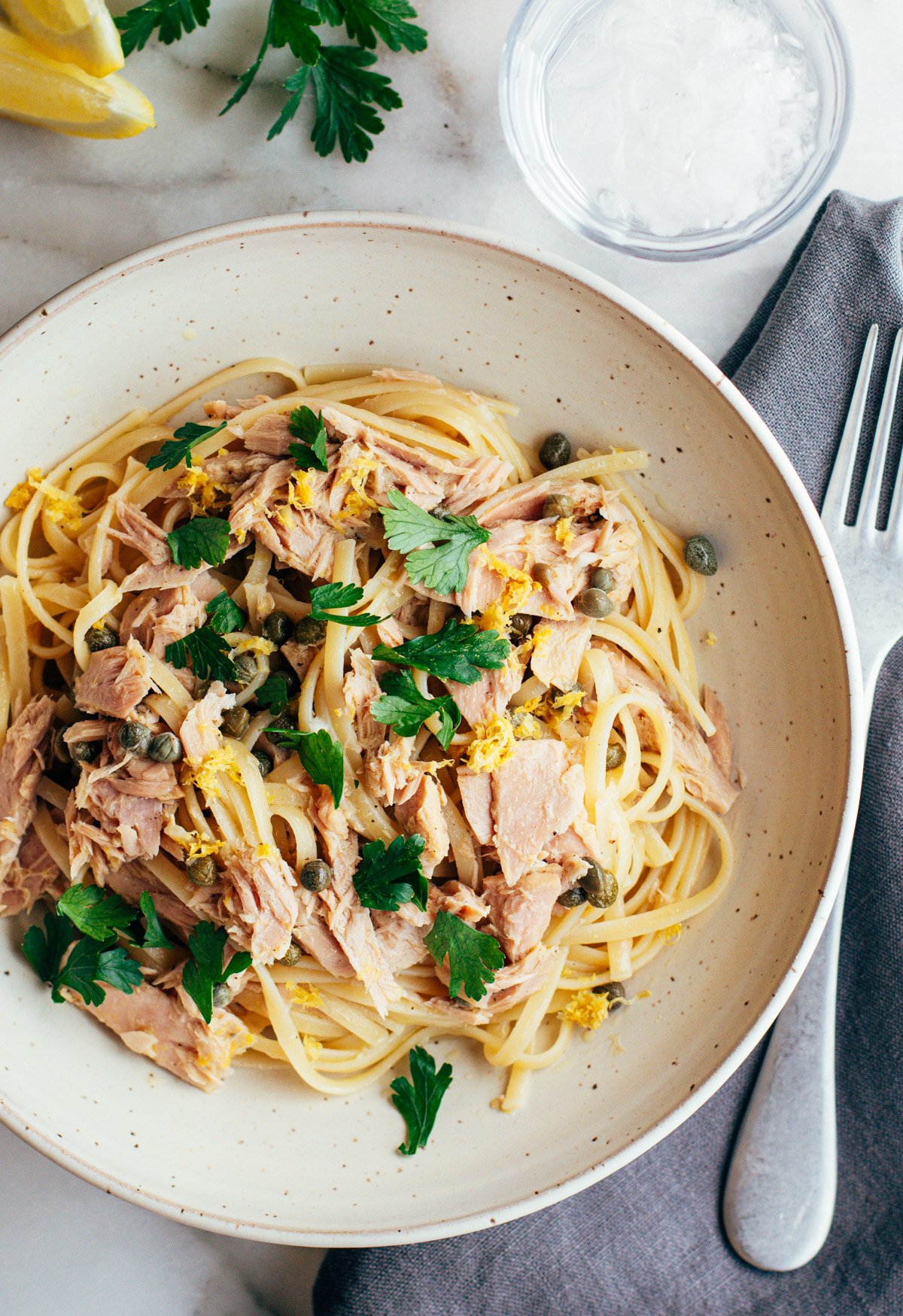 tuna pasta served in an off-white ceramic bowl..