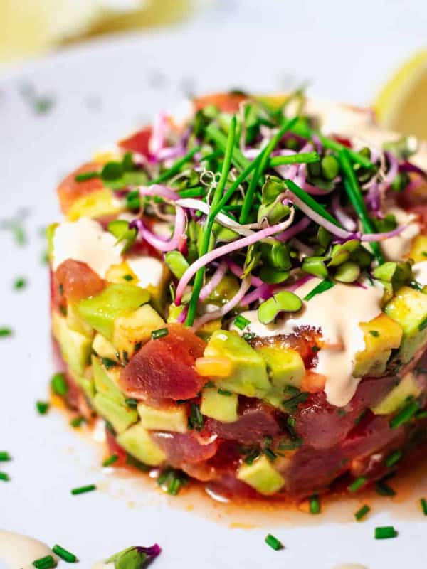 tuna tartare served on a white plate.