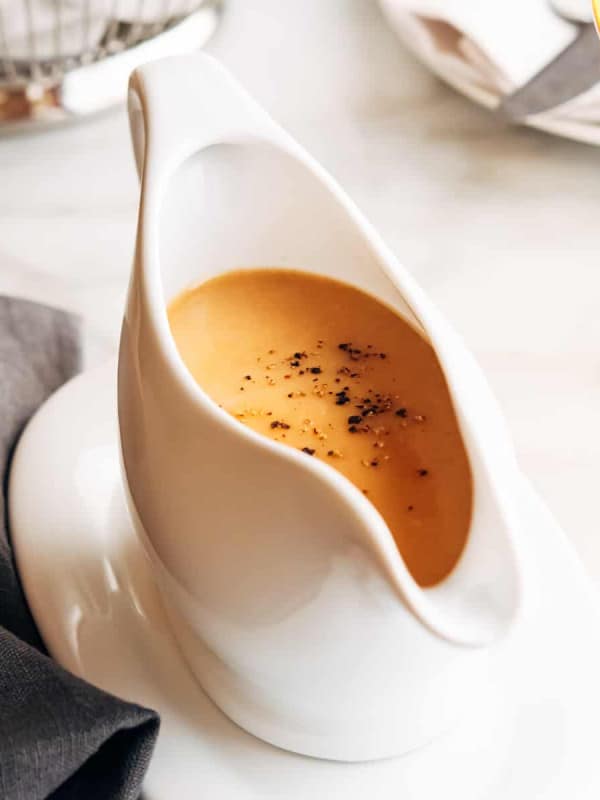 Turkey Gravy without Drippings in a white ceramic gravy boat.