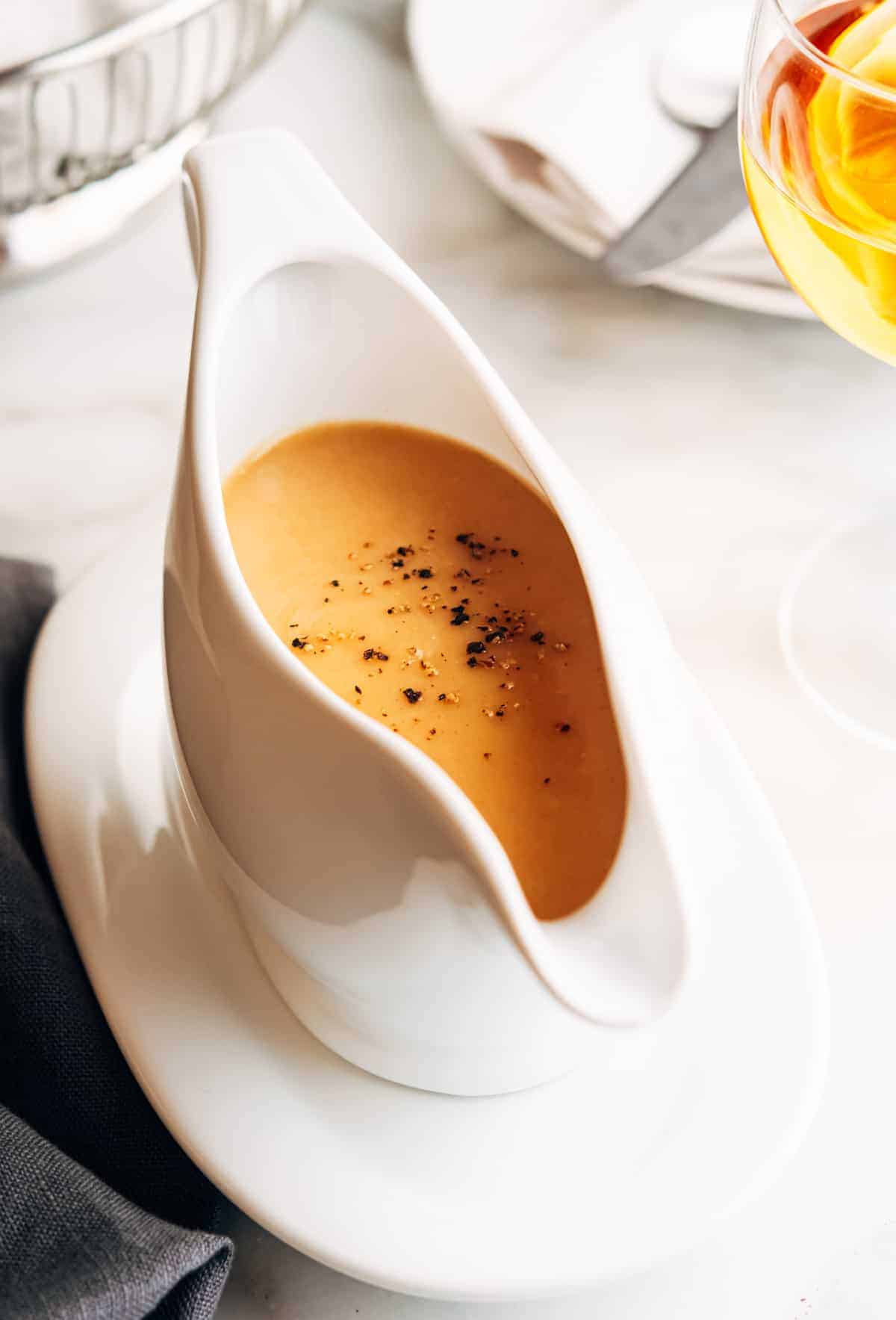 Turkey Gravy without Drippings in a white ceramic gravy boat.