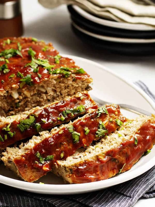 Turkey Meatloaf Sliced on a White Platter