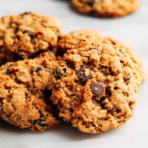 Almond Flour Oatmeal Cookies stacked on a white marble board