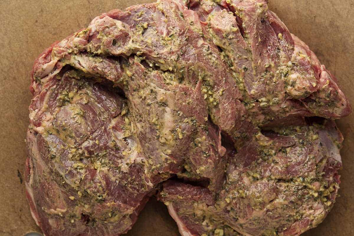 boneless leg of lamb underside rubbed with herb paste